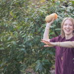 Dr Kathryn Kissell demonstrating contagious stress — the hot potato effect of stress passing between people.