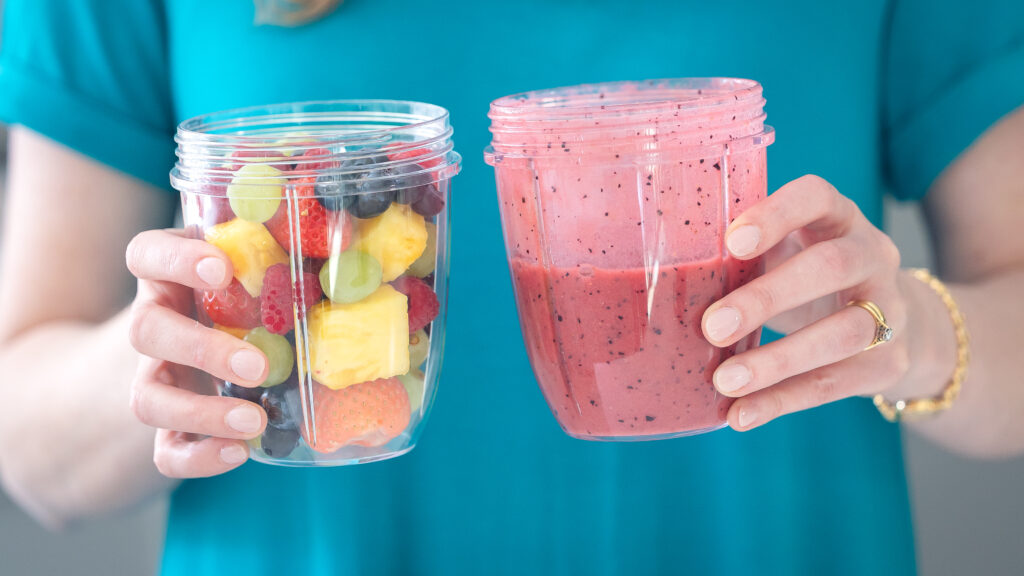 Dr Kathryn Kissell holding a fruit salad in one hand and a fruit smoothie in the other. Indicating how our team brain changes from distinct to blended thinking under pressure. 